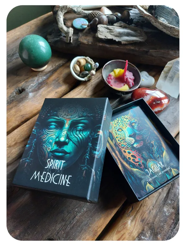 Spirit Medicine Oracle Deck box opened showing 64 illustrated cards and guidebook